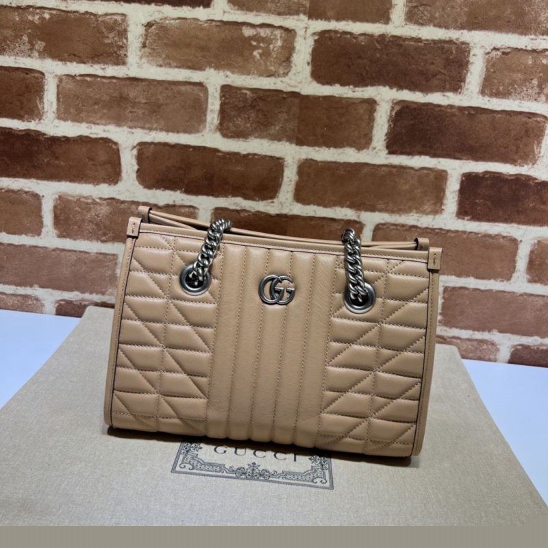 G*u*i shopping bags